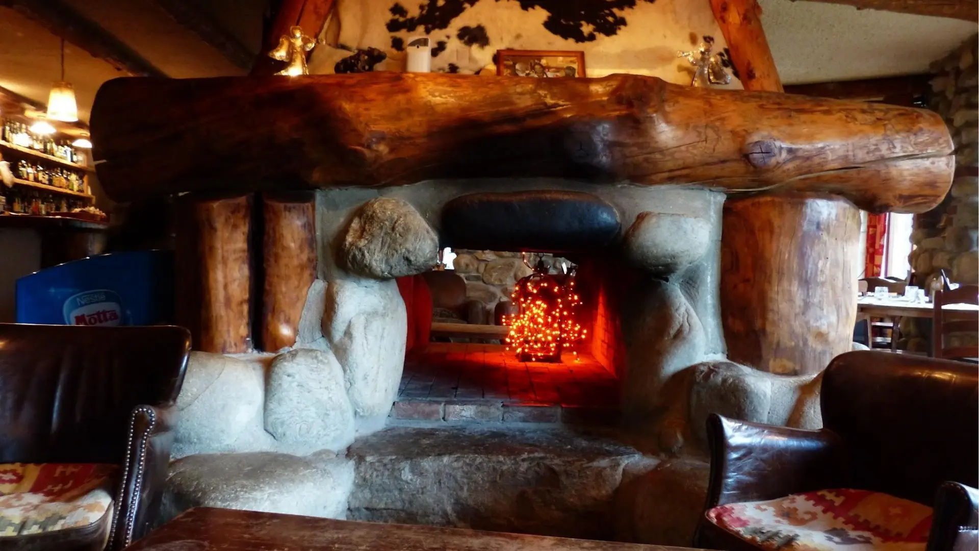 Why Rustic Fireplaces Feel More Architectural With Exposed Timber